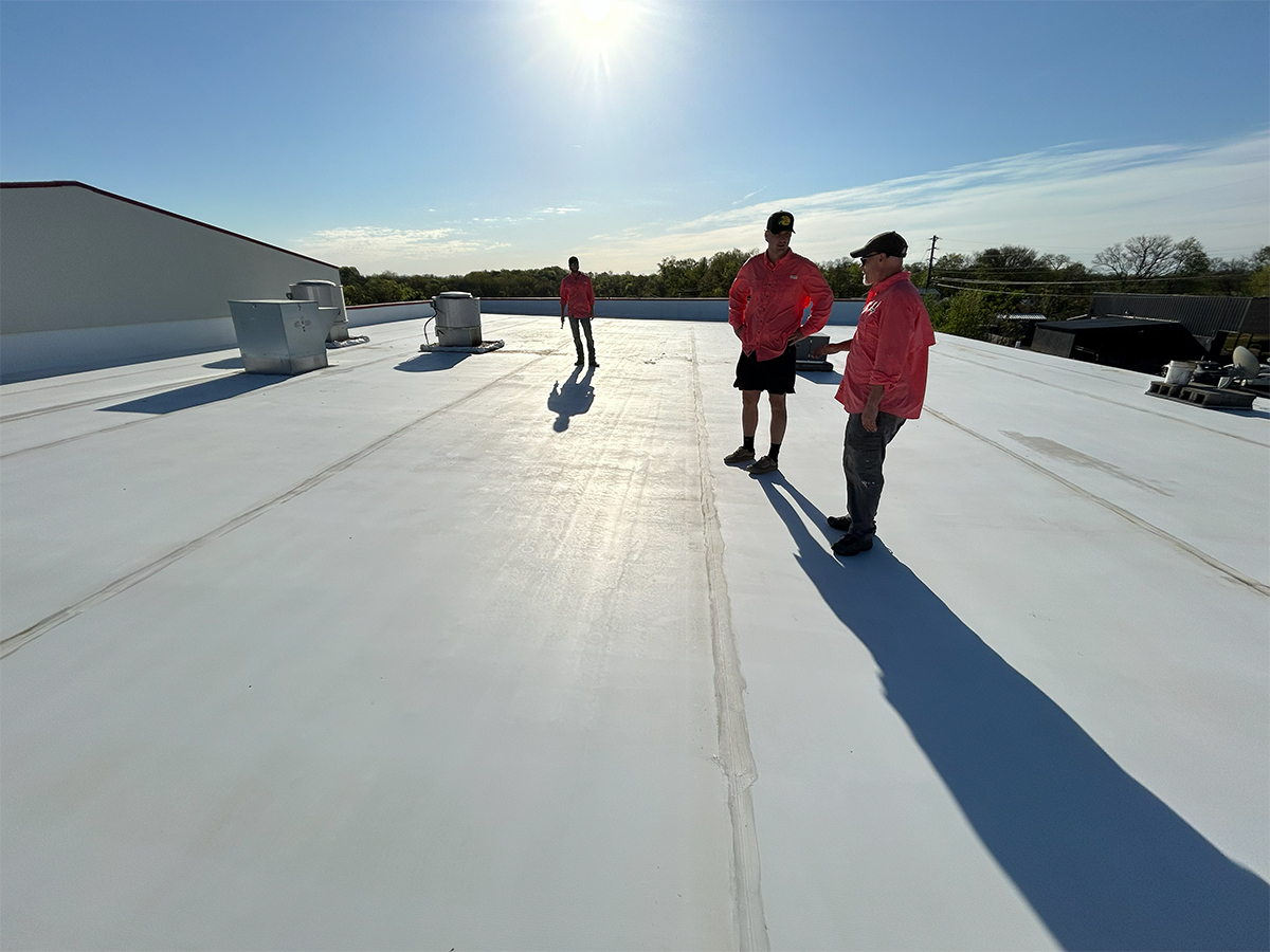 Crew on a completed reflective Phoenix roof restoration in Columbia, Tennessee